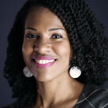 Headshot photo of Andrene J. Castro
